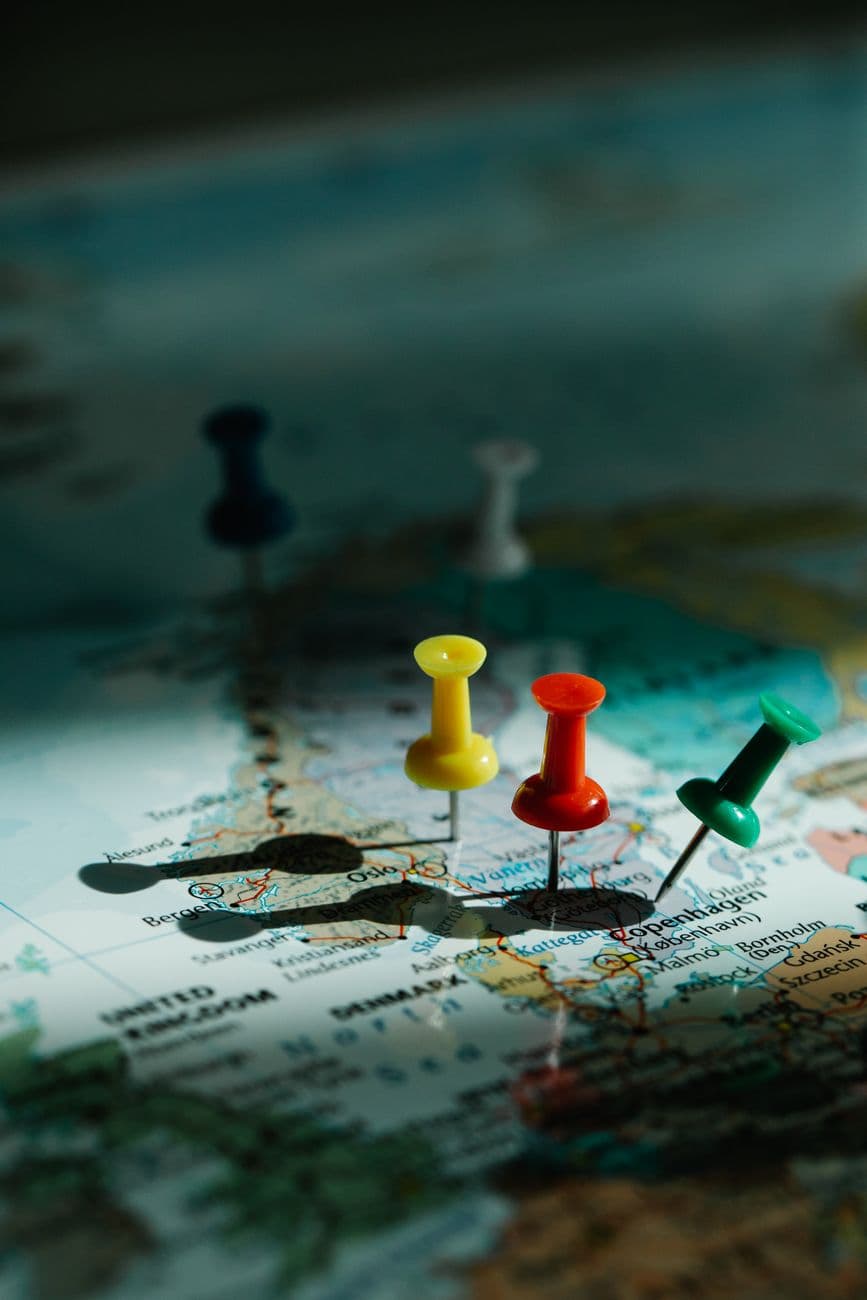 World map marked with colorful location pins